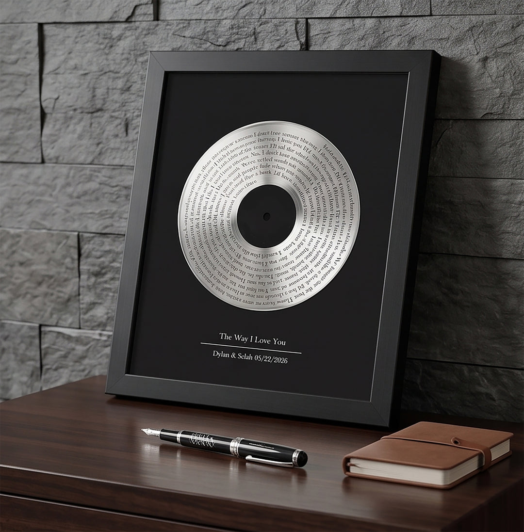 Framed vinyl record with text on a wooden surface against a stone wall background