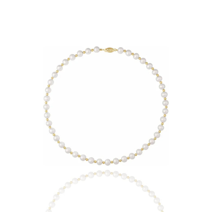 Pearl necklace with gold accents on a white background - Anniversary Gift