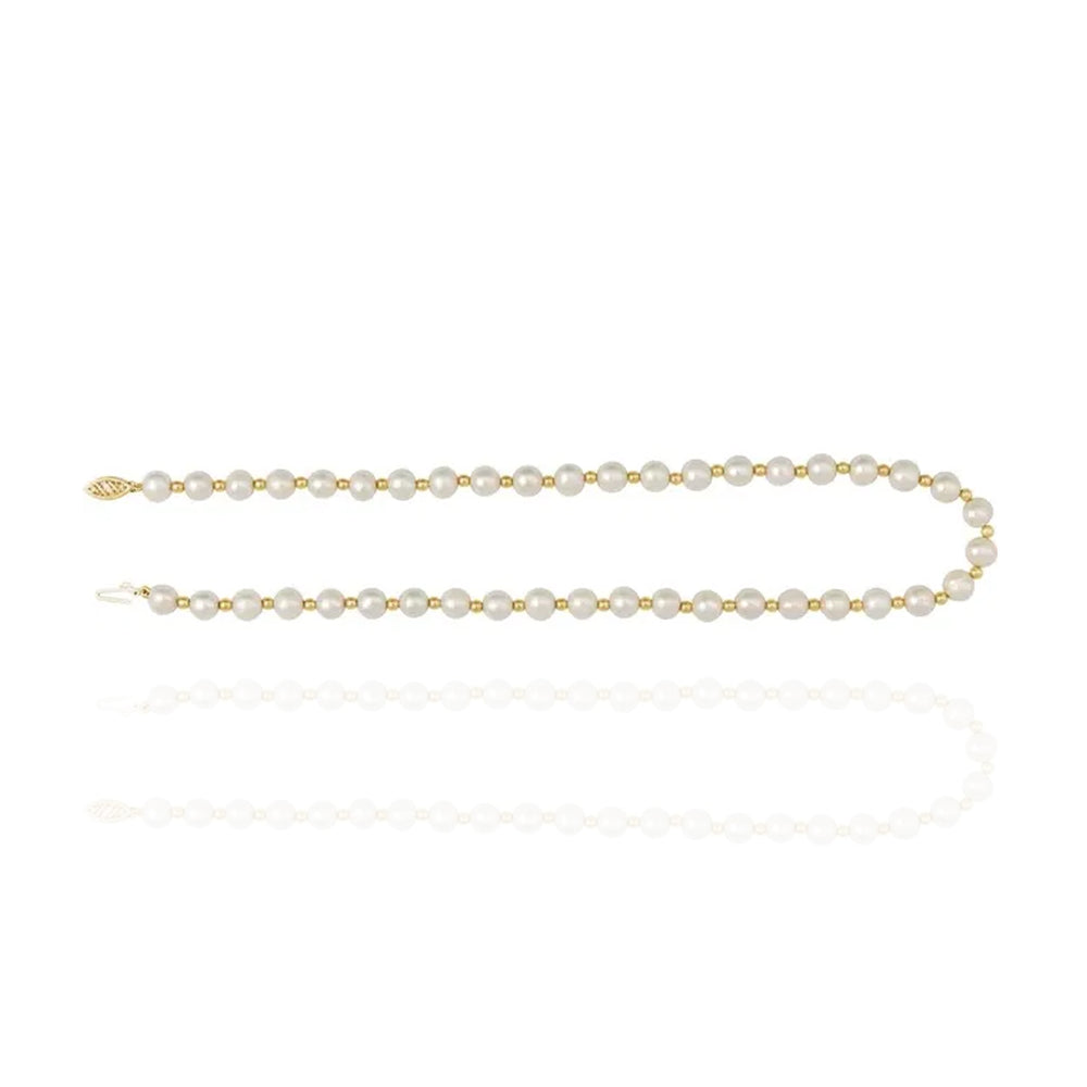 Pearl necklace with gold chain on a white background - Pearl Anniversary Gift