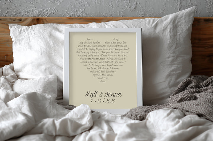 Yellow anniversary gift custom lyrics print on a bed with white pillows and bedding